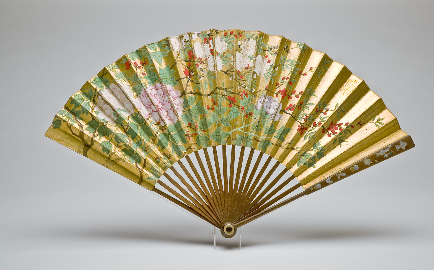 Jiang Tingxi, Peonies, Morning Glories, Cherries, and Chinese Cotton (Peonías, Glorias de la mañana, Cerezas y Algodón chino), late 17th-early 18th century. Ink and color on gold paper, mounted as fan on original staves inlaid with mother-of-pearl. Gift of Marilyn and Roy Papp in Honor of the Museum's 50th Anniversary.