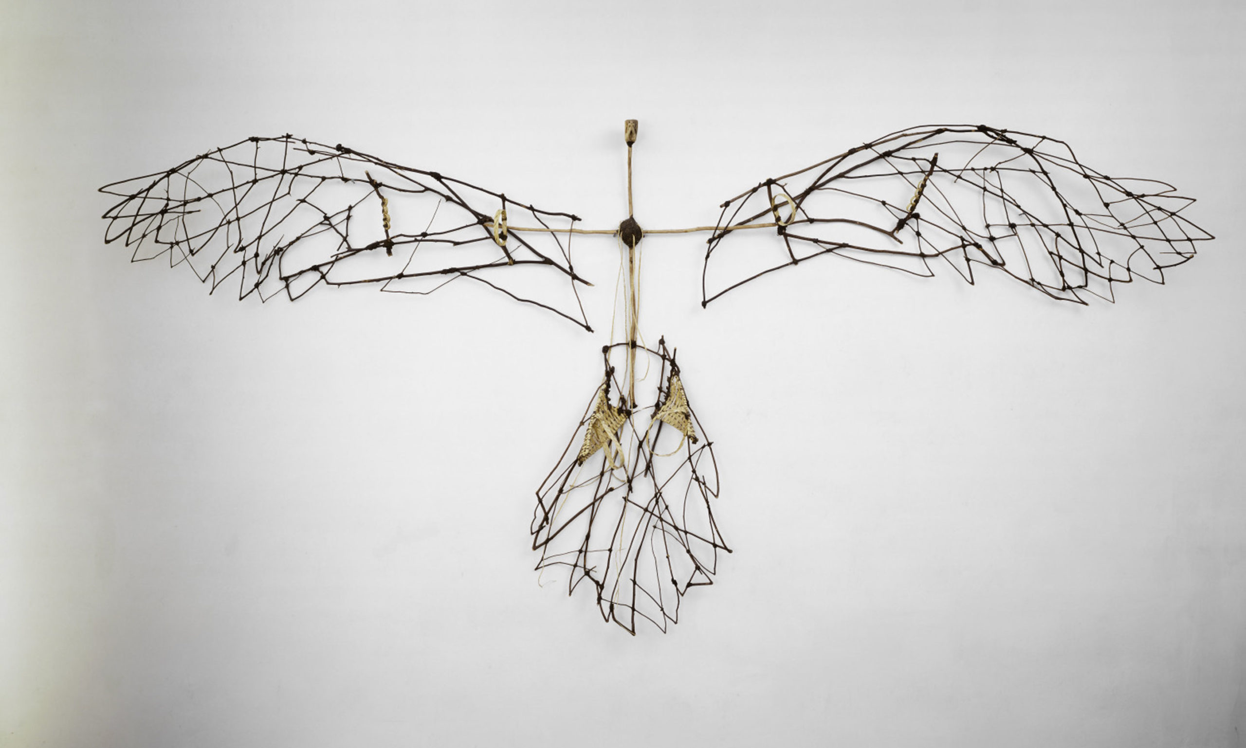 Juan Francisco Elso, Pájaro que vuela sobre América [Bird that Flies Over America], 1985. Carved wood, branches, wax, jute thread, and basket elements. Courtesy of Mr. Reynold C. & Dr. Marlene L. Kerr, Miami, Florida. Photo: Manu Sassoonian.